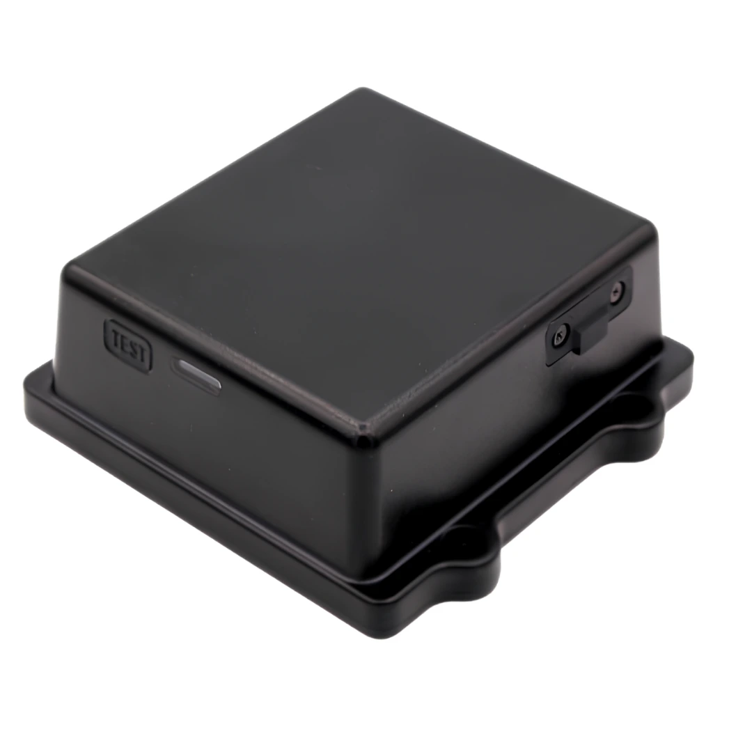 Black Matrack dashcam hardwire module with a test button and status light for backup power connection